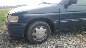 Plastové lemy blatníkov pre Ford Escort MK VII (1995-2002), 3-dverová verzia