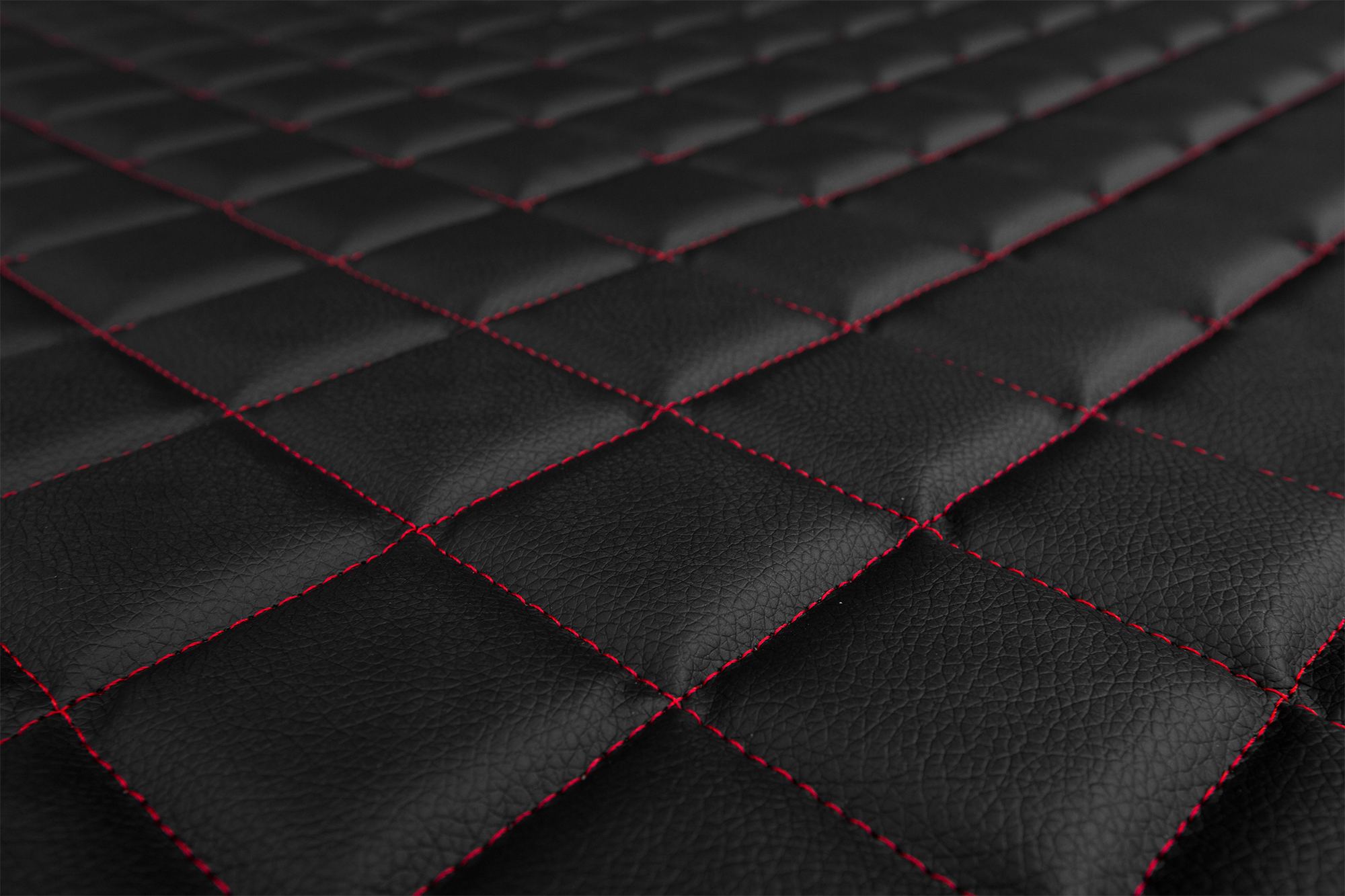 Detail povrchu a prešívania poťahov ELEGANCE Q: Čierno-červená