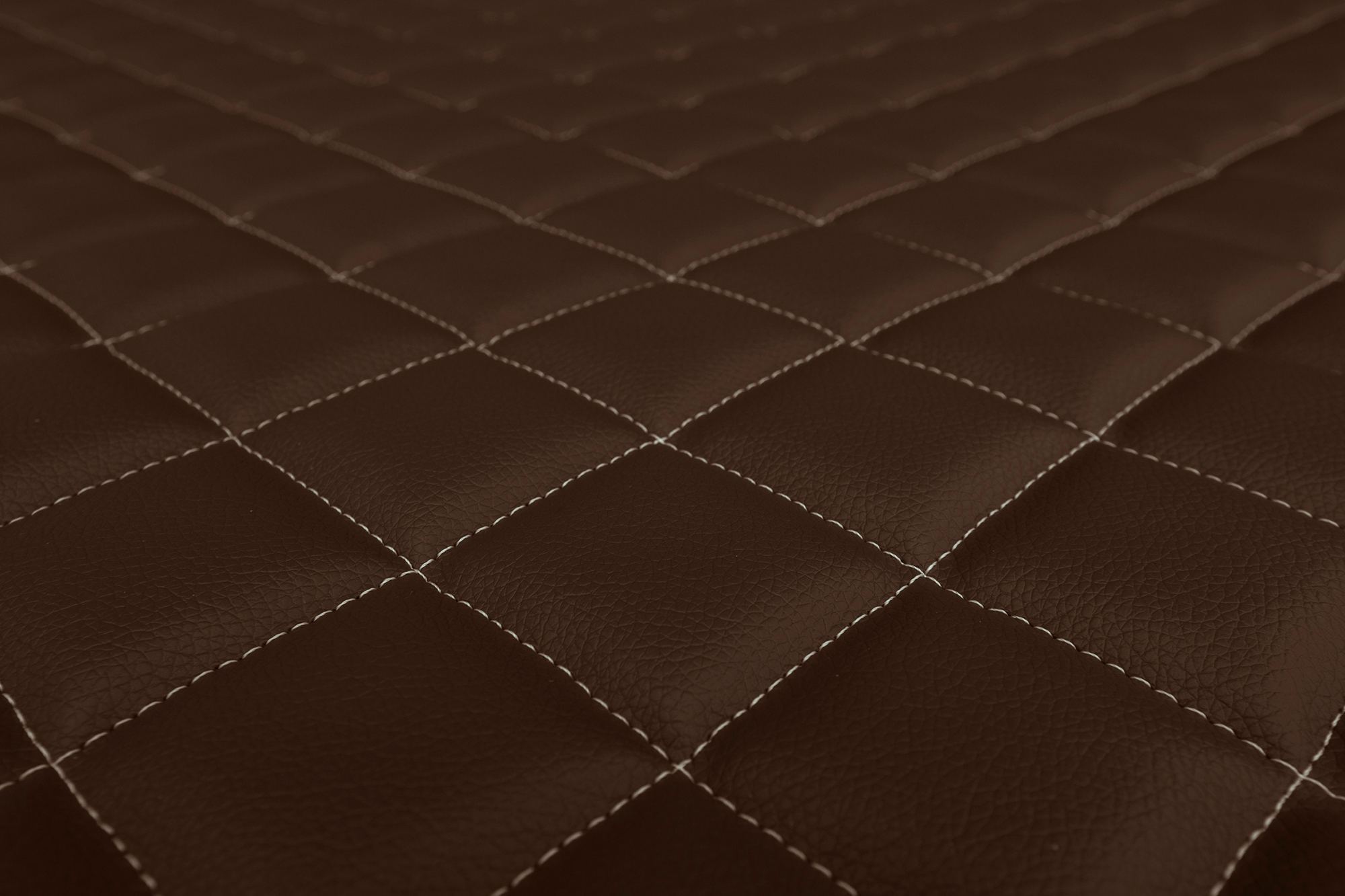 Detail povrchu a prešívania poťahov ELEGANCE Q: Hnedá